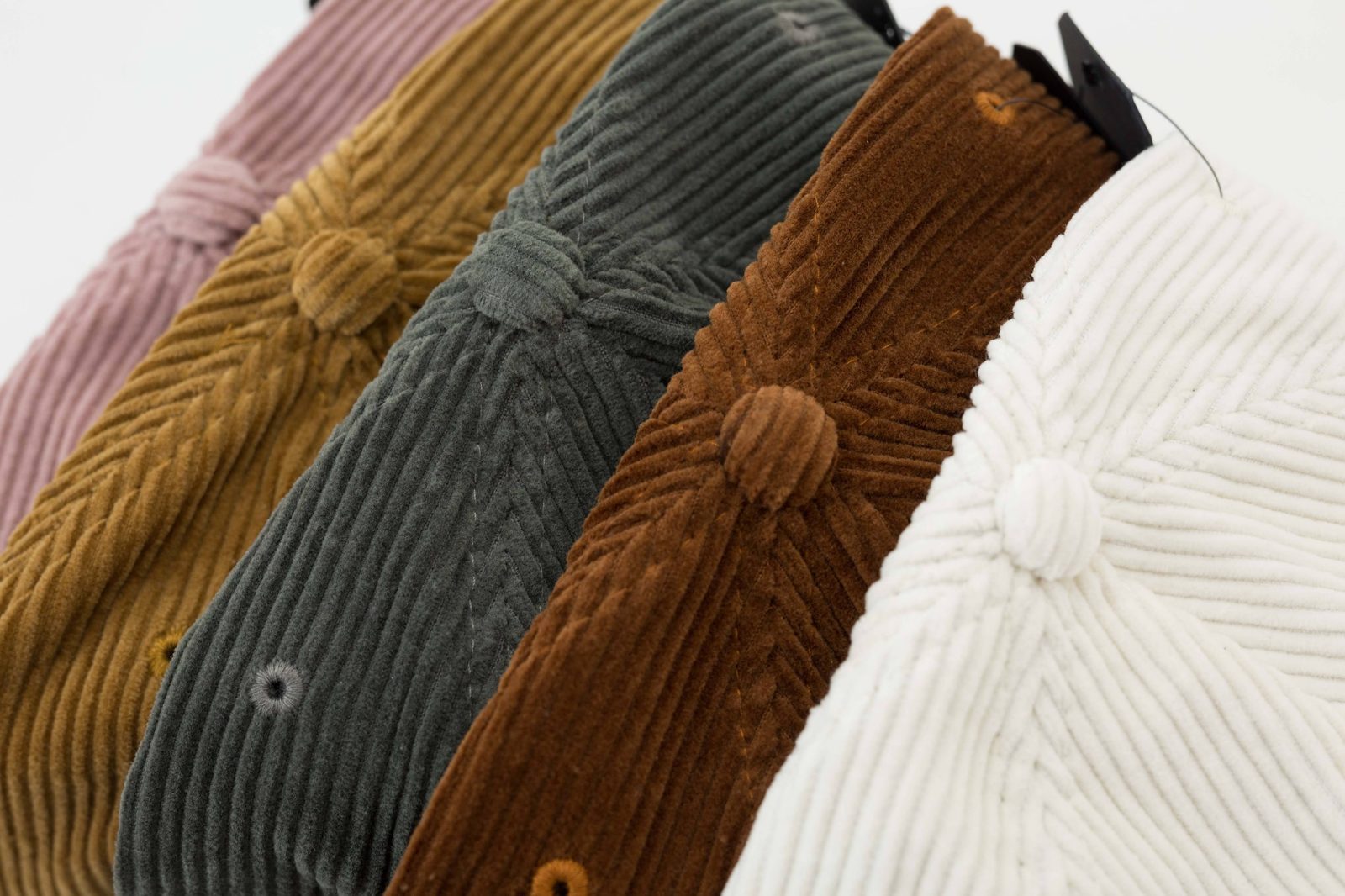Row of Rora Basics corduroy caps in multiple colorways